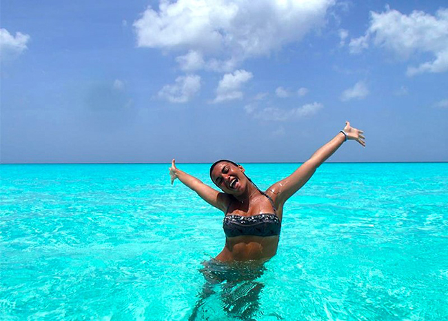 Brenda very happy to swim in the crystal clear waters of the Caribe.