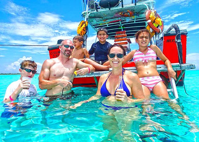 The Robinson family just relaxing at El Cielo Cozumel during a snorkeling tour.